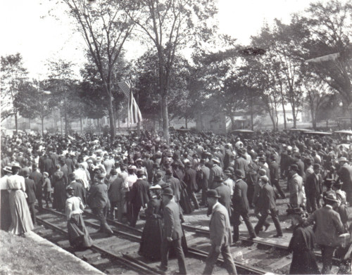 Crowd greeting Admiral Dewey at rail station, 1899.
