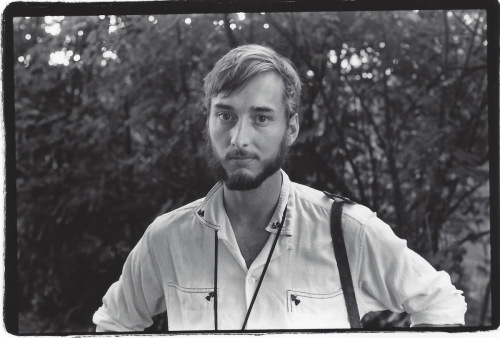 Rob Woolmington, with photography gear, 1980.
